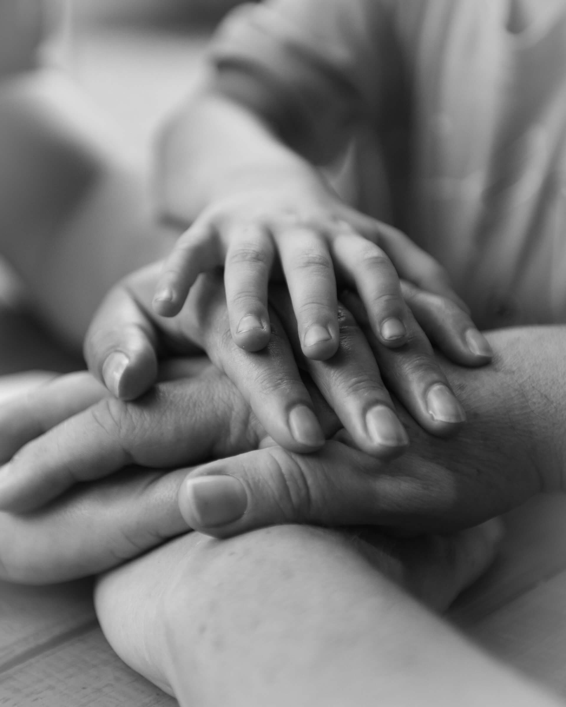 Hands giving compassion and aid